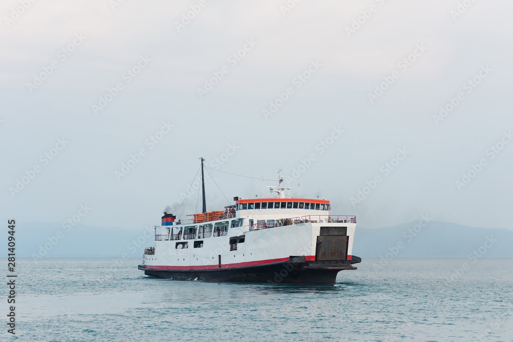 passenger ferry sailing in the ocean between the islands of Thailand passenger ferry sailing in the ocean between the islands of Thailand