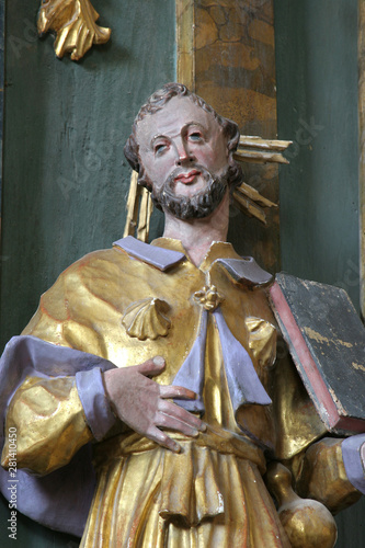 Statue of Saint on the altar of the Saint Roch in the Church of Saint Mary Magdalene in Cazma, Croatia photo