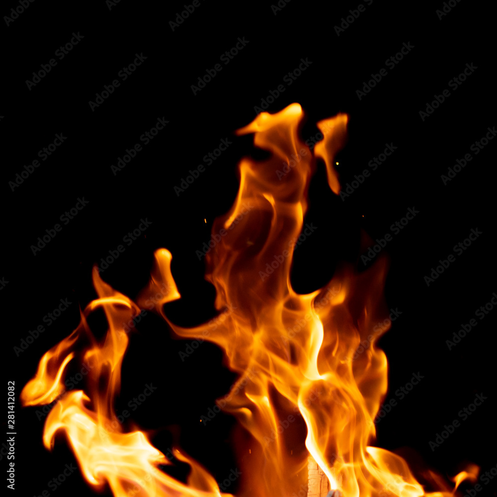 Fototapeta premium strong fire flames on black isolated background