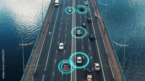 Aerial view autopilot cars driving on bridge highway with speed and identity technology scan system. Careful self driving with innovative traffic surveillance control technology. 4K dolly zoom visual