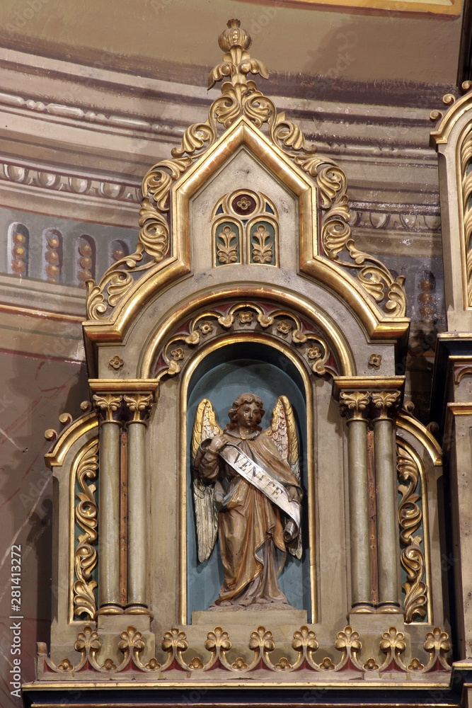 Angel, statue on the main altar of the Visitation of Mary in the church of the Saint Peter in Ivanic Grad, Croatia Angel, statue on the main altar of the Visitation of Mary in the church of the Saint Peter in Ivanic Grad, Croatia