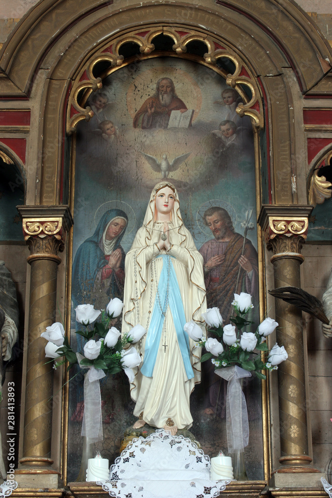 Our Lady of Lourdes, statue on the altar of the Holy Family in the church of the Saint Nicholas in Lijevi Dubrovcak, Croatia