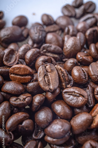 Coffee Beans Background. Close Up fresh roasted brown