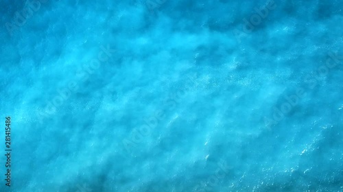 Aerial video from above of beautiful blue ocean waves