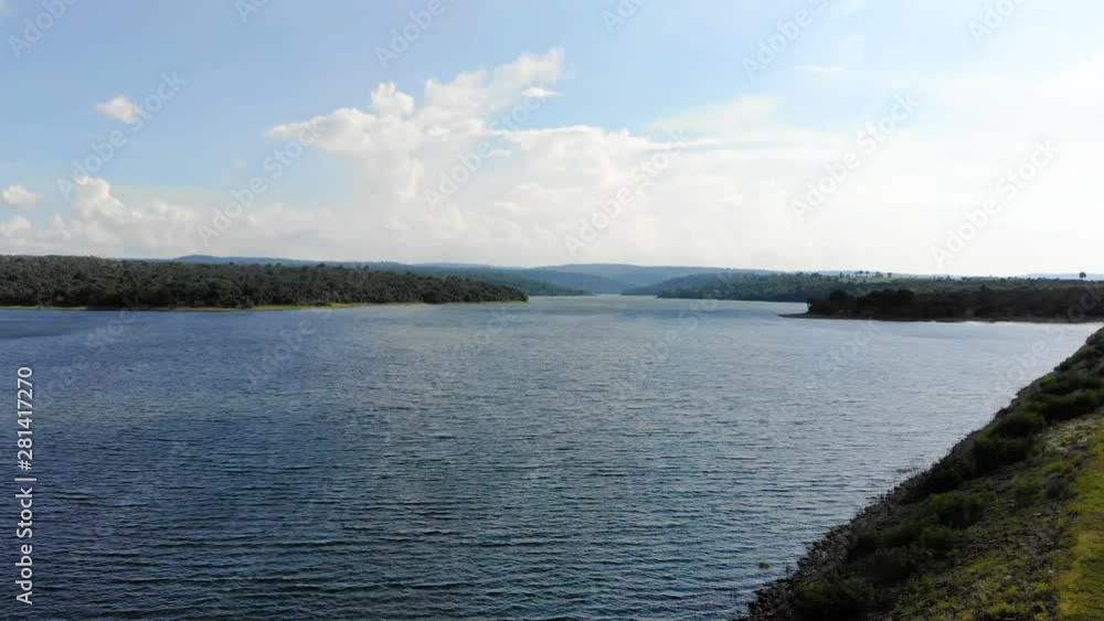 Drone shot aerial view scenic landscape of reservoir dam at the countryside Drone shot aerial view scenic landscape of reservoir dam at the countryside