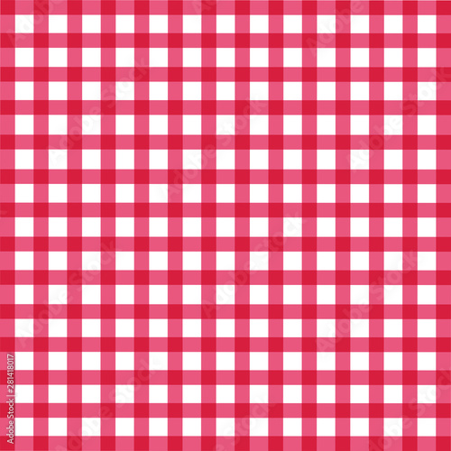 Red bright checkered tablecloth on the table