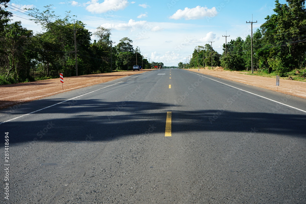 Fototapeta premium The road during the construction of the original surface is asphalt surface 10 meters wide. Location in Thailand