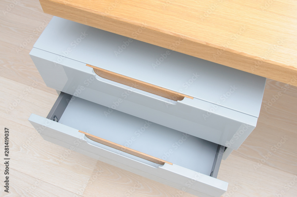 Furniture design pull out empty drawers of modern sleek writing table