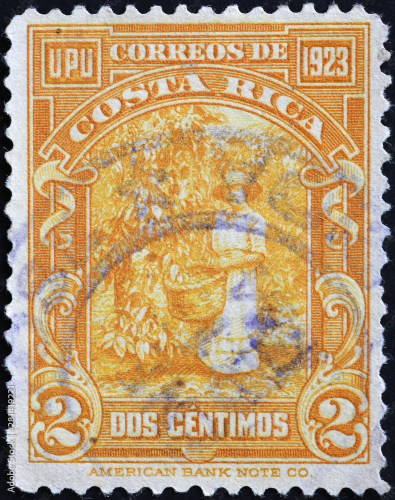 Harvesting cocoa pods on ancient stamp of Costa Rica Harvesting cocoa pods on ancient stamp of Costa Rica