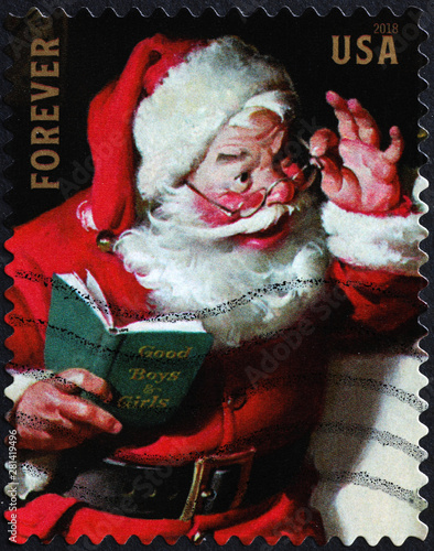 Smiling Santa Claus on american stamp photo