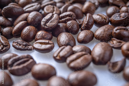 Coffee Beans Background. Close Up fresh roasted brown