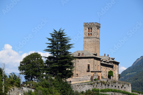 The castle of Sarre among the green of the mountains in Aosta Valley - Italy