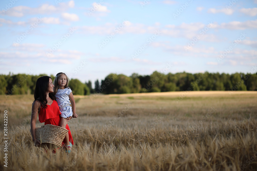 Summer landscape and a girl on nature walk in the countryside. Summer landscape and a girl on nature walk in the countryside.