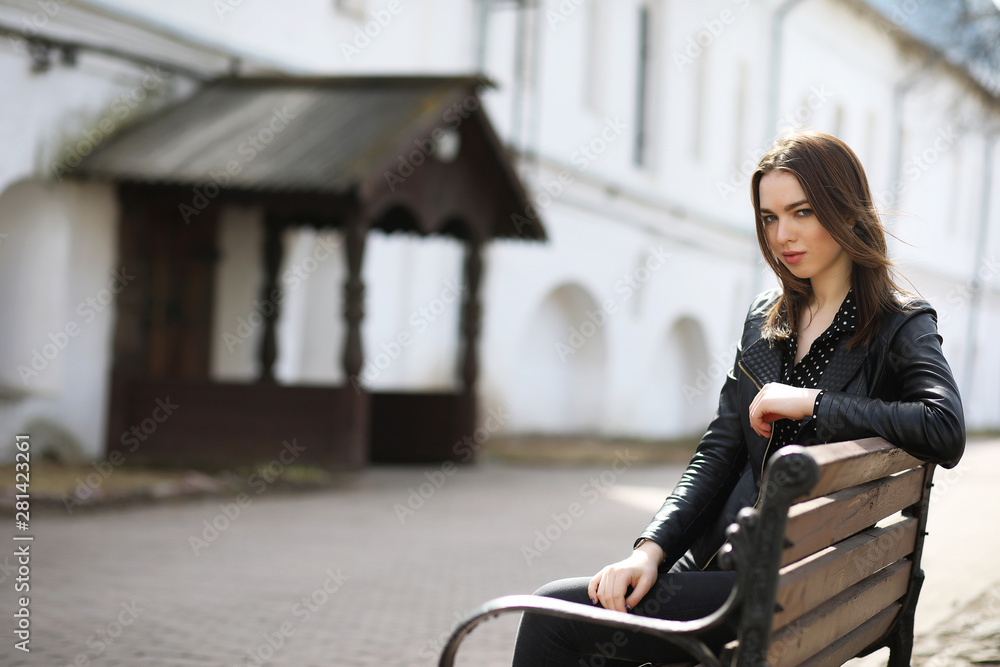 Girl on a walk through the spring city Girl on a walk through the spring city