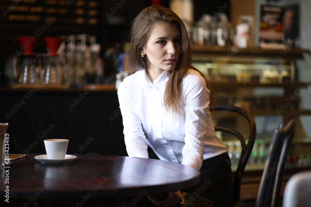 The girl in the cafe breakfast The girl in the cafe breakfast