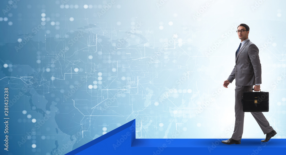 Businessman walking on arrow in business concept Businessman walking on arrow in business concept