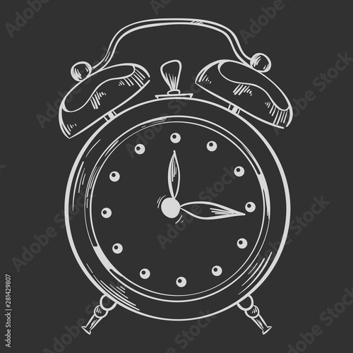 Alarm clock drawn in chalk on a gray board background