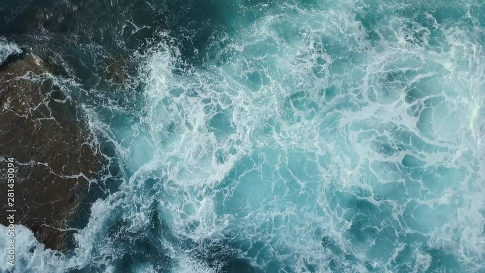 Aerial View Of Sea Waves. Blue Ocean Water Background Aerial View Of Sea Waves. Blue Ocean Water Background