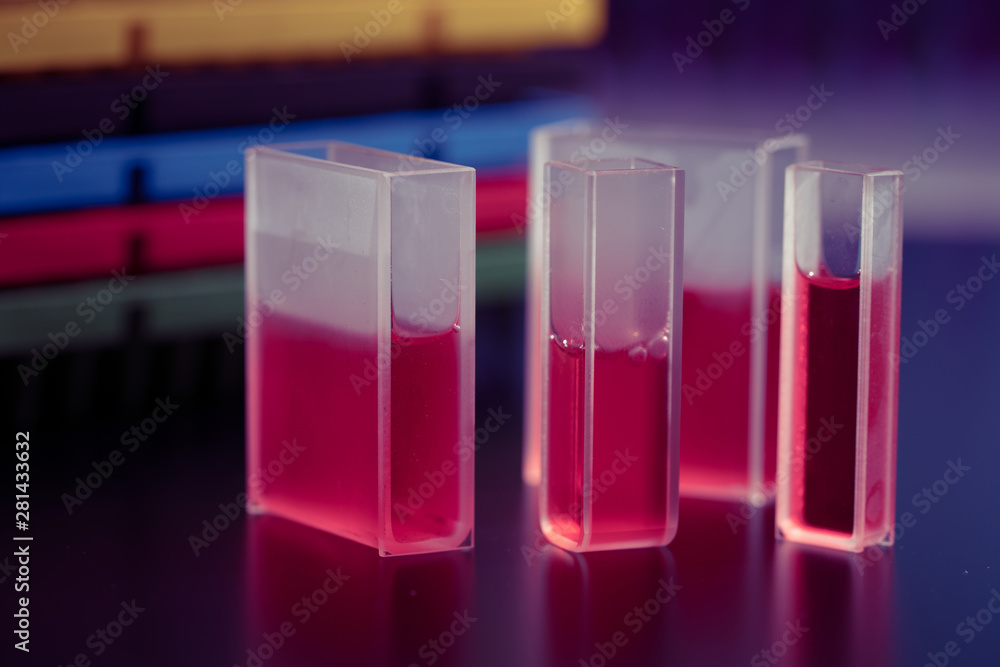 Quartz cuvette with the sample liquid for measurement Stock Photo