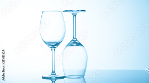 Glasses with water on blue background