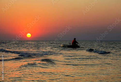 fishing boat at sunset