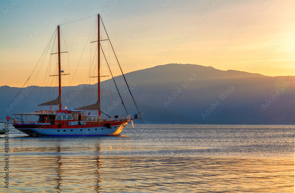 Yacht on the background of the sea and mountains. Yacht on the background of the sea and mountains.