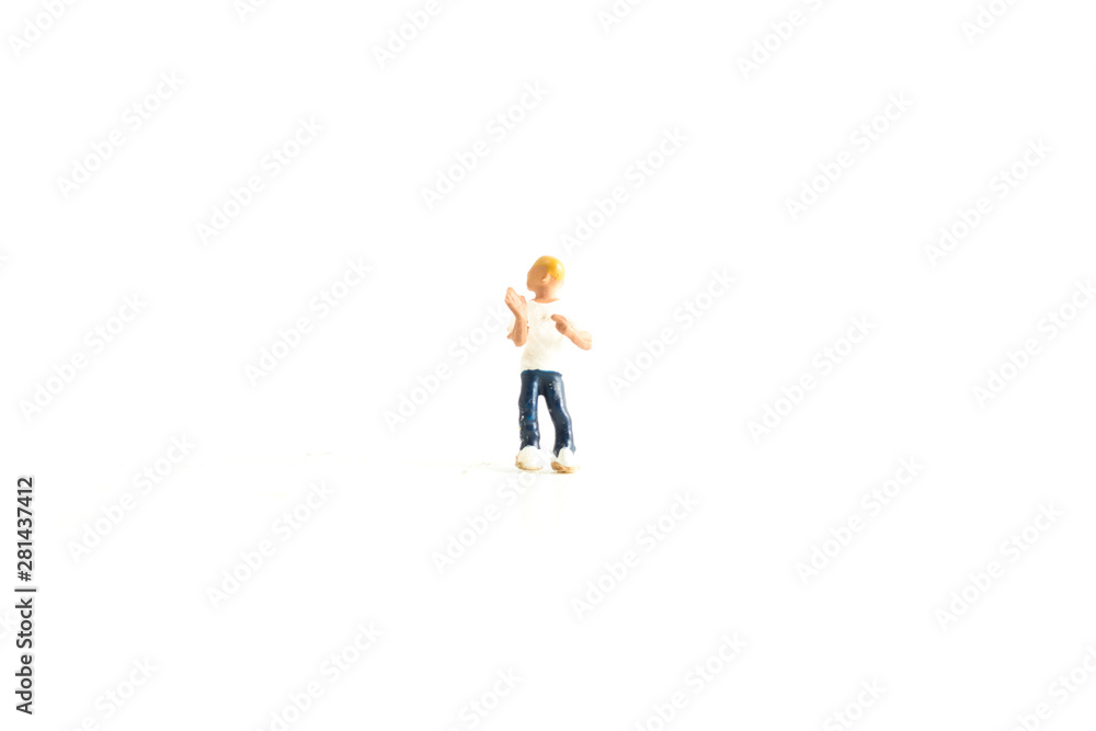 Miniature person (kid) on a white isolated background Miniature person (kid) on a white isolated background