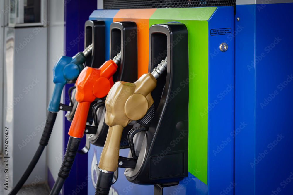 Gas station. Fuel dispenser and car ready to be filled up at petrol pump station. Gas station. Fuel dispenser and car ready to be filled up at petrol pump station.