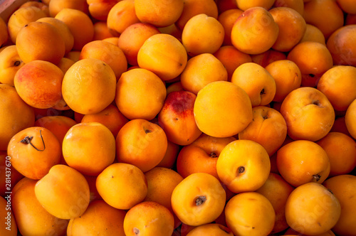 Ripe apricots, natural appearance on the shop counter.