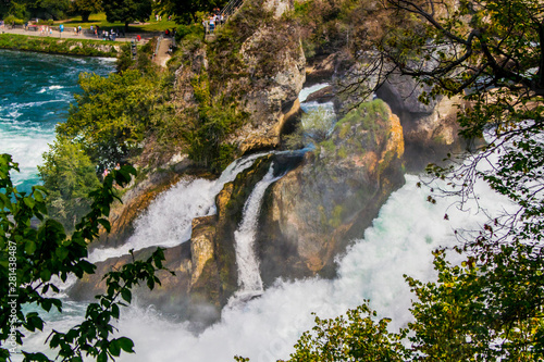 Rushing water during summer at the Rheinfalls photo