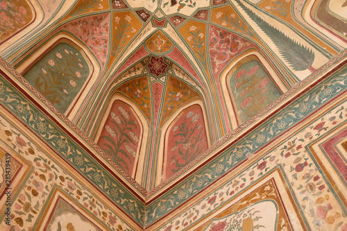 Beautiful ornament on wall of palace in Amber Fort in Jaipur, Rajasthan, India