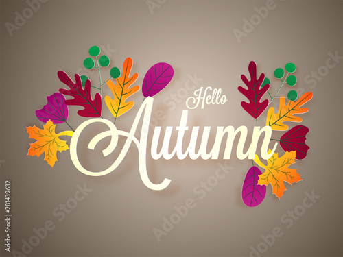 Hello Autumn calligraphy text with colorful leaves on glossy background can be used as greeting card or poster design. photo