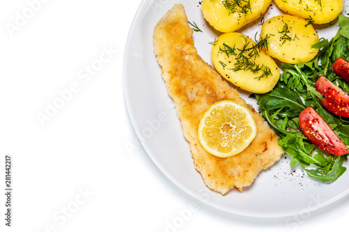 Fried fish with potatoes on white background