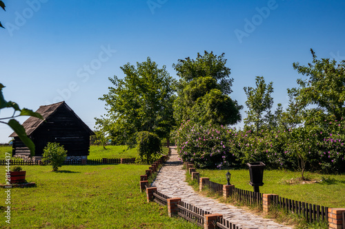 Old rustic wooden house in village Moravski Konaci near the Velika Plana in Serbia photo