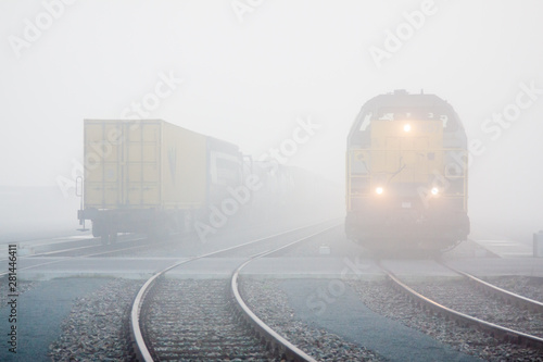 Container train on a foggy day photo