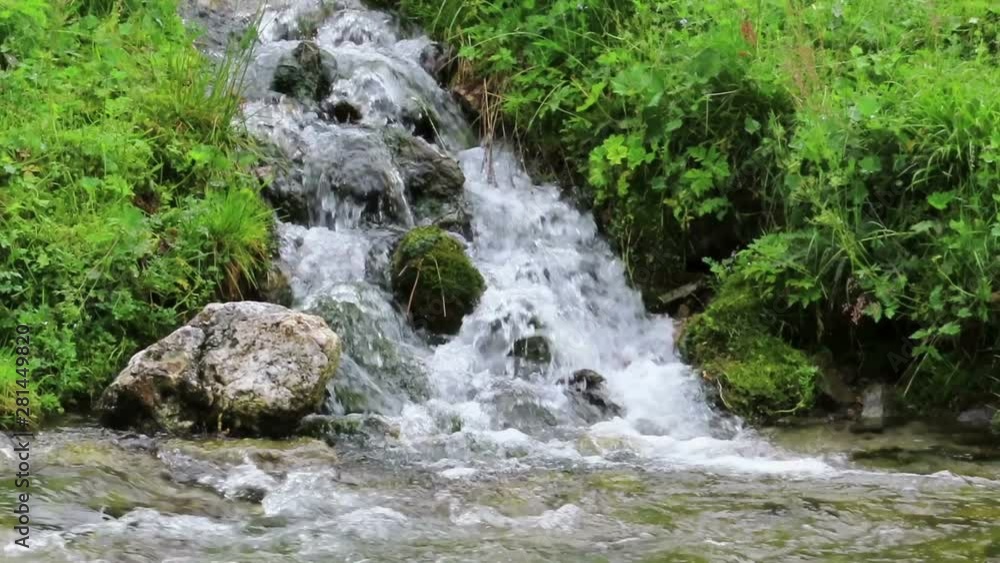 Krummbach stream flowing through austrian alps in Zillertal valley.