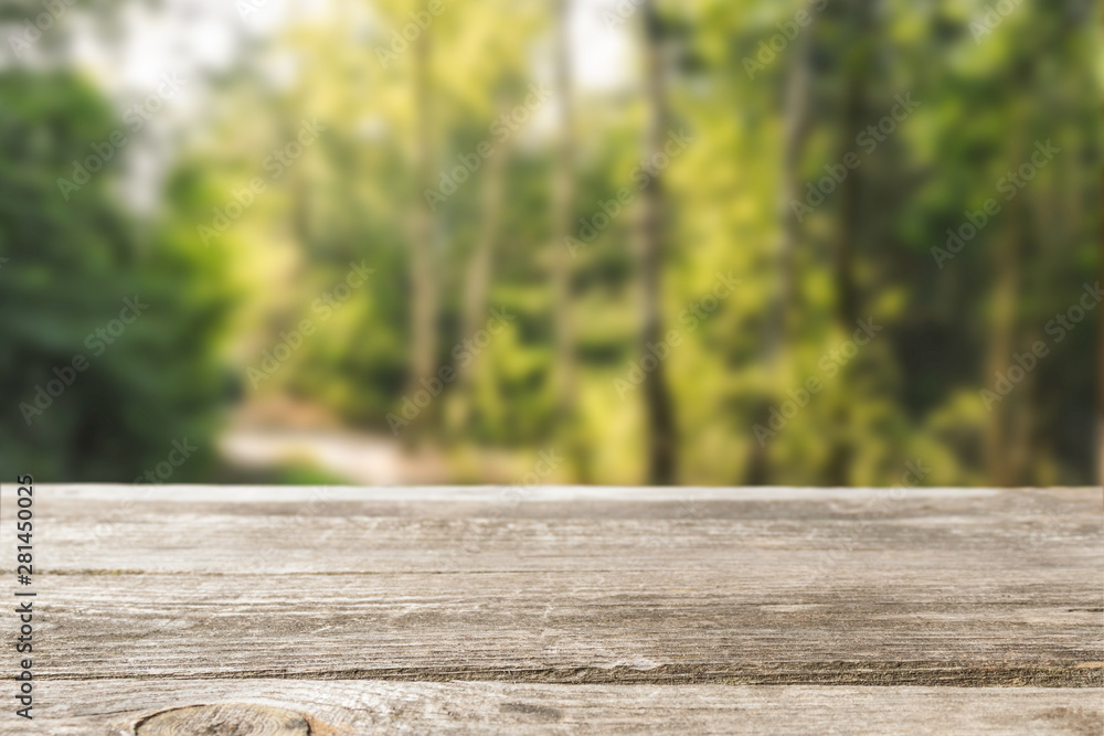Wood hunter table in the forest. Blurred background. Wood hunter table in the forest. Blurred background.