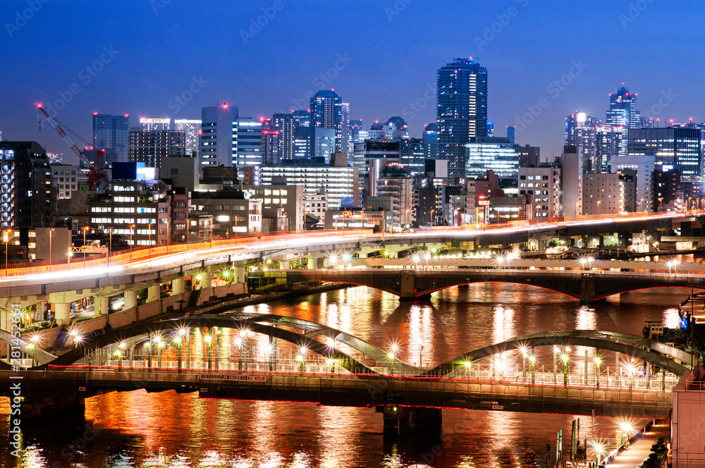Night light shot of Sumida river and Umaya Bashi - Kuramae Bashi bridge. Tokyo - Japan