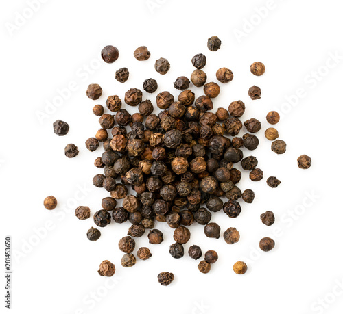 Pile of black pepper peas on a white background. The view of the top.