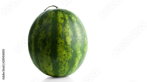 Round watermelon with a tail isolated on white background. Popular fruit. Selective focus.