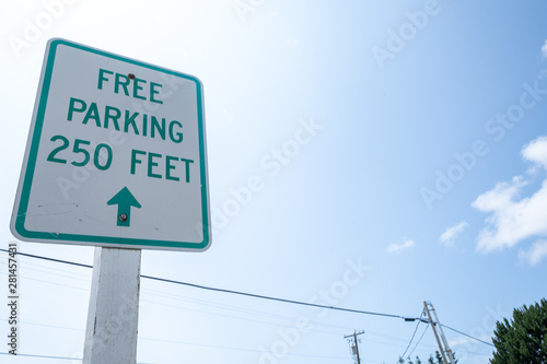 Free Parking Sign, alerts drivers to parking spaces free of charge in 250 feet