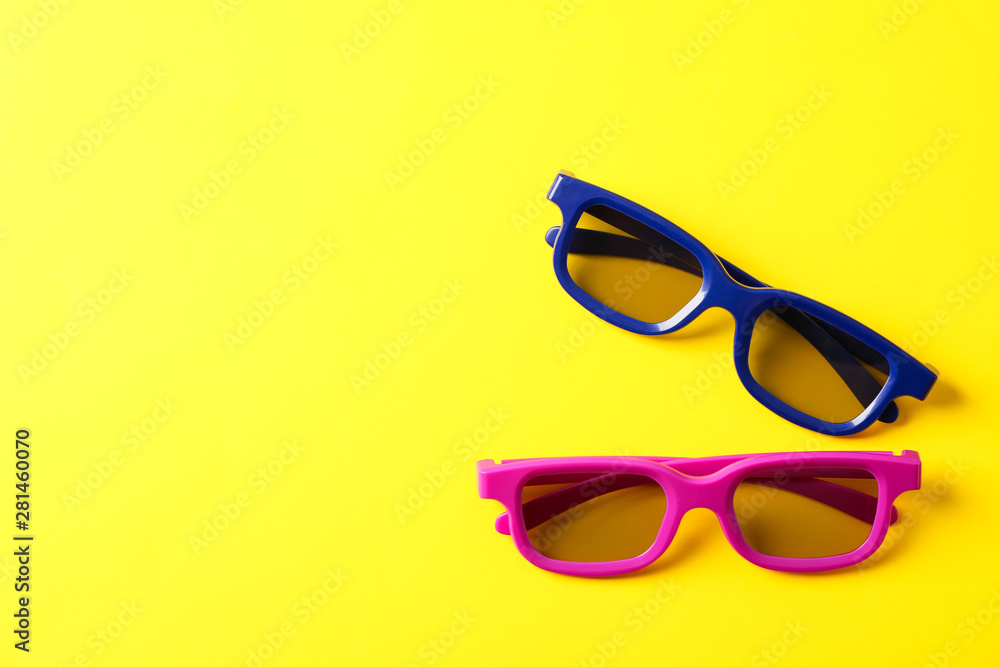 Flat lay composition with 3d glasses on yellow background Flat lay composition with 3d glasses on yellow background