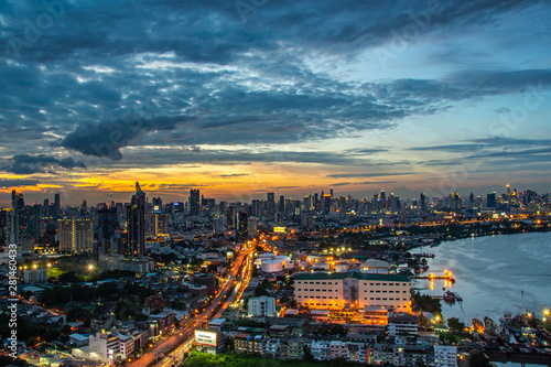 Sky view of Bangkok with skyscrapers in the business district in Bangkok along the Chao Phraya Rive in the during beautiful twilight give the city a modern style.
