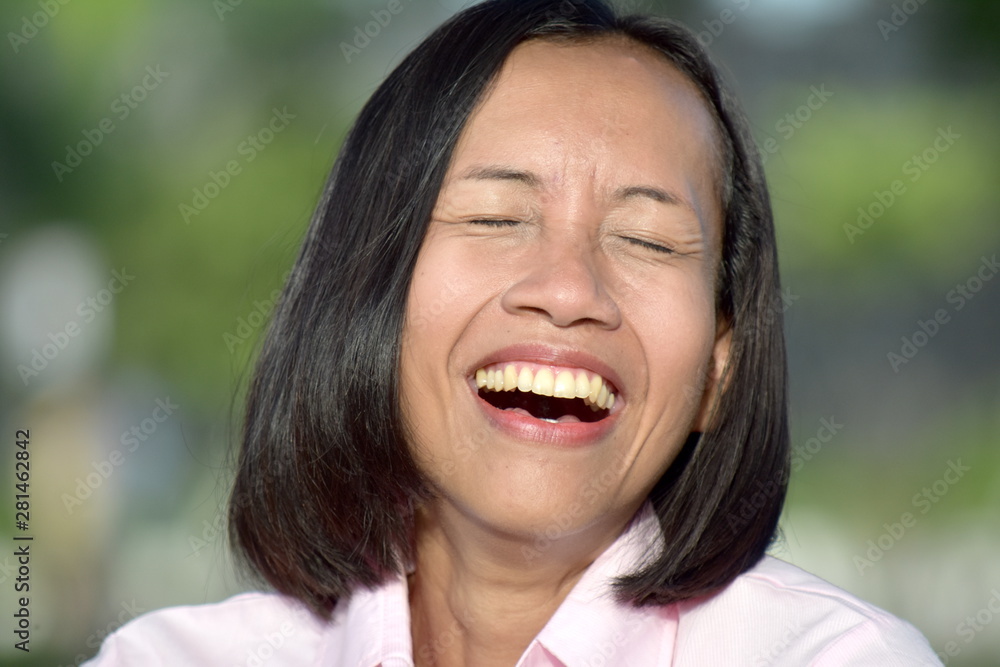Youthful Filipina Woman And Laughter Youthful Filipina Woman And Laughter
