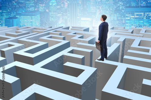 Businessman trying to escape from maze