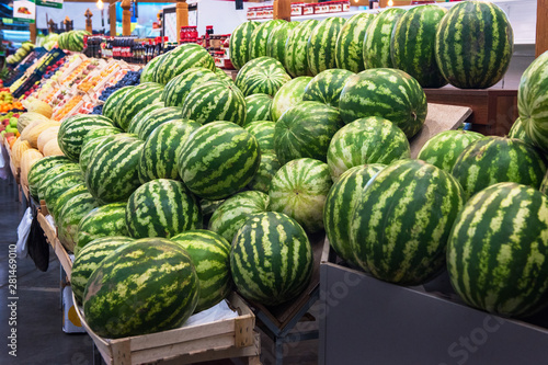 Ripe watermelons in farmer market: fresh organic healthy watermelons at grocery store.