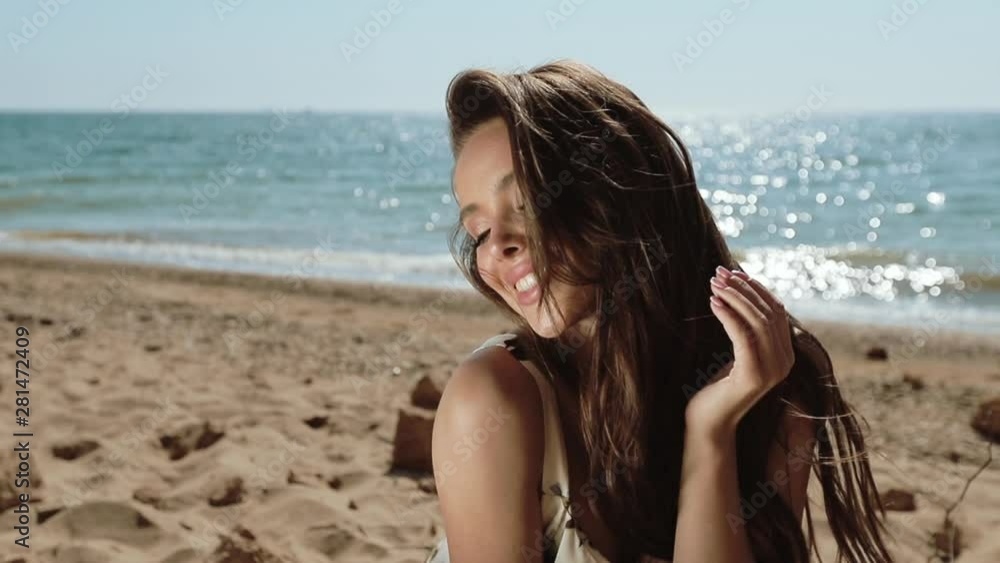 Attractive Girl Is Enjoying At Sea Coast On Summer Vacation Happy Day. Attractive Girl Is Enjoying At Sea Coast On Summer Vacation Happy Day.