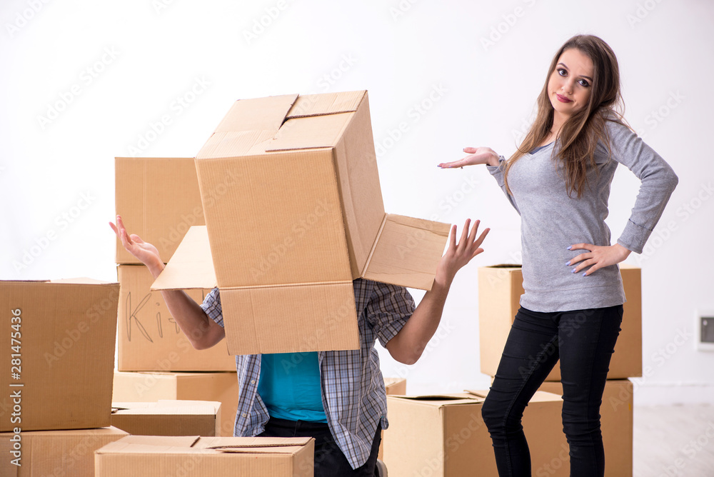 Young pair moving to new flat Young pair moving to new flat