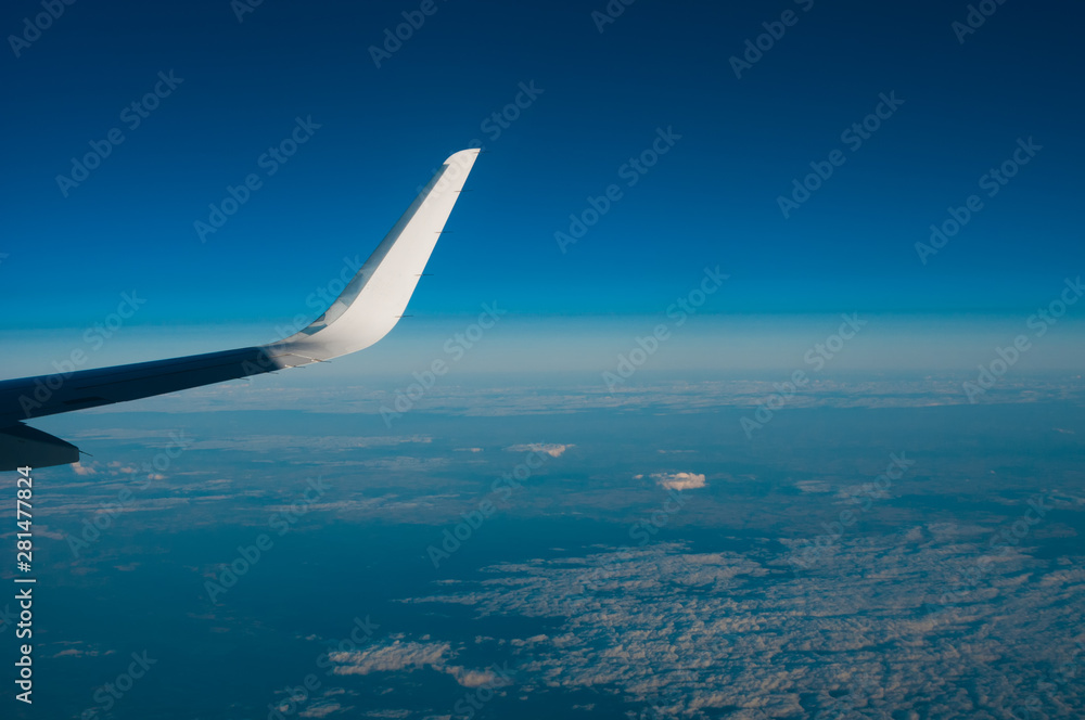 Aerial view from plane on blue sky Aerial view from plane on blue sky