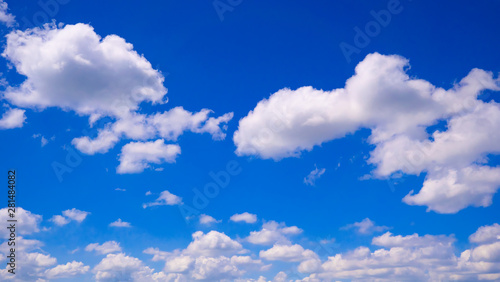 Blue sky with clouds in summer sunny day